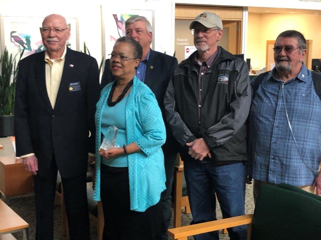 Dr. Beverly Waddleton received the Community Builders Award from Flora Mason Lodge #119. Pictured from left are Ken Johnson, Dr. Waddleton, Steve Cates, Danny Lonsberry and Bill Bennett. (Monitor photo by Larry Tucker)